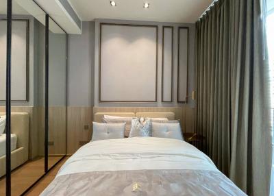Elegant bedroom with a large bed and modern decor