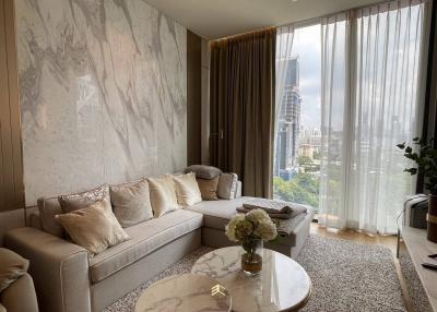 Elegant living room with marble wall and city view