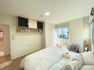 Modern cozy bedroom with natural lighting