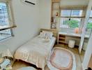 Cozy and well-lit bedroom with modern amenities