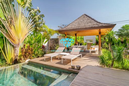 Luxurious backyard with pool and gazebo set in a lush garden