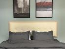 Cozy bedroom with modern wall art and neutral color palette