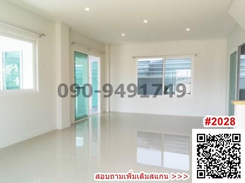 Spacious unfurnished interior of a modern building with large windows and glossy tiled floor