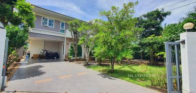 Spacious two-story house with front garden and paved driveway