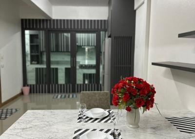 Modern kitchen with marble countertop and stylish dinnerware