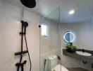 Modern bathroom interior with glass shower and sink