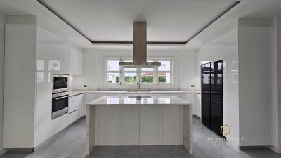 Modern kitchen with island and integrated appliances