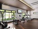 Modern home gym with fitness equipment and large windows