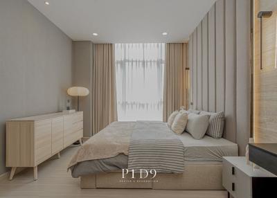 Modern bedroom with neutral tones and elegant decor