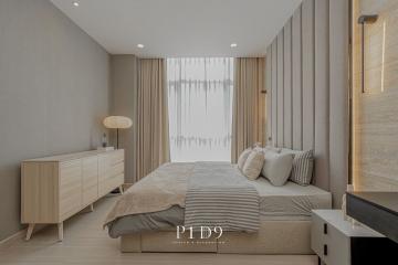 Modern bedroom with neutral tones and elegant decor