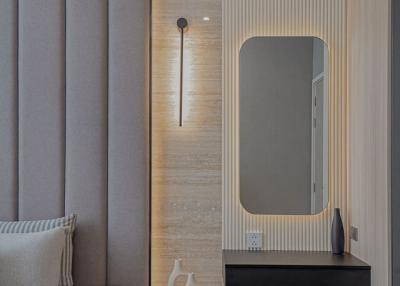 Cozy modern bedroom interior with elegant design features including lighting
