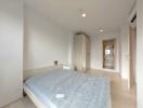 Minimalist bedroom with en-suite bathroom