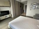 Modern bedroom with integrated living space including kitchenette