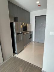 Modern kitchen with stainless steel appliances and sleek cabinetry