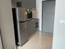 Modern kitchen with stainless steel appliances and sleek cabinetry