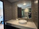 Modern bathroom interior with sink and mirror