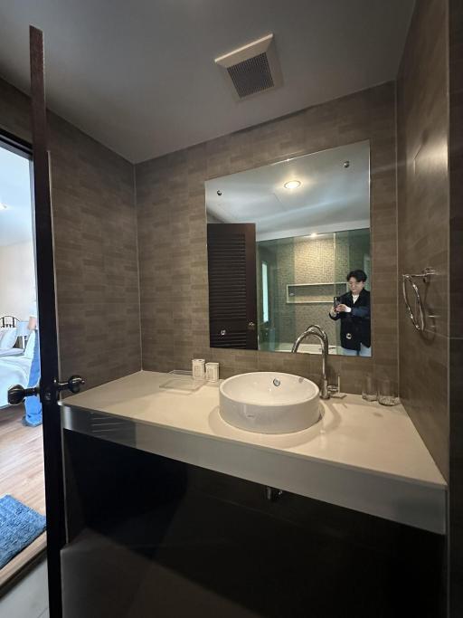 Modern bathroom interior with sink and mirror