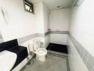 Clean and white-tiled bathroom with modern fixtures