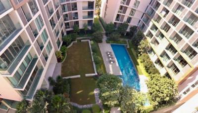 Luxury apartment complex courtyard with swimming pool