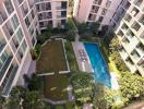 Luxury apartment complex courtyard with swimming pool