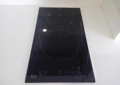 Modern black ceramic cooktop in kitchen