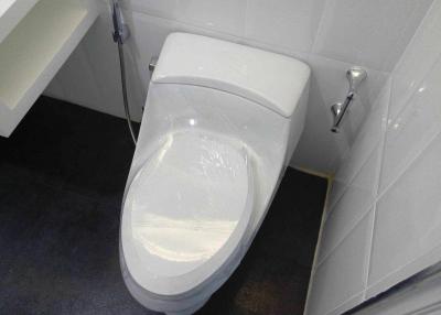 Modern white ceramic toilet in a clean bathroom