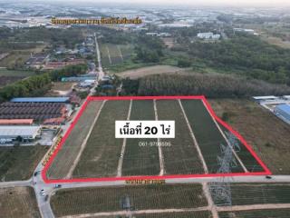 Aerial view of a vast plot of land outlined for potential development