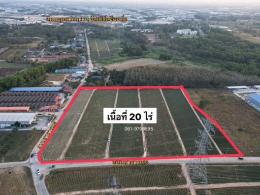 Aerial view of a vast plot of land outlined for potential development