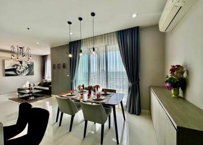 Modern dining area with stylish decor and city view