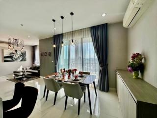 Modern dining area with stylish decor and city view