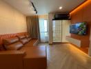 Contemporary living room with ample seating and modern amenities