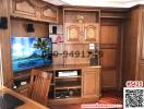 Wooden furnished living room with entertainment system