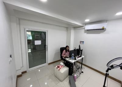 Modern home office with sliding door and air conditioning