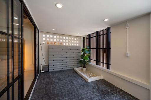 Modern entryway with sleek design and natural light