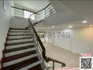 Open staircase with wooden steps in a bright interior