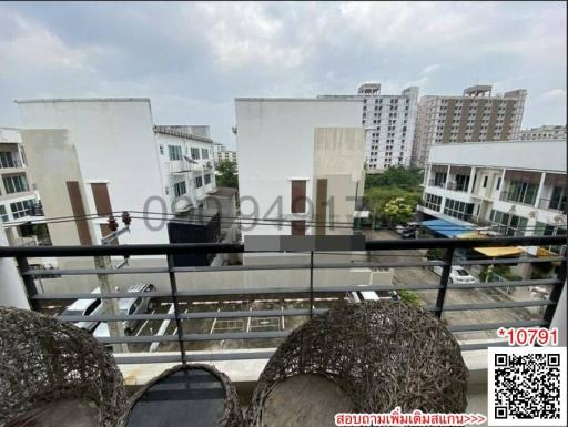 View from the balcony overlooking neighboring buildings