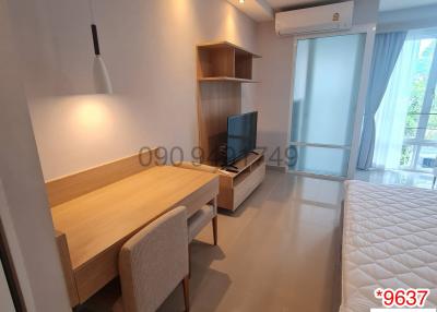 Cozy Bedroom with Study Area and Natural Light