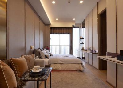 Modern bedroom with a neutral color palette and ample lighting