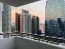 City view from the balcony of an apartment at dusk