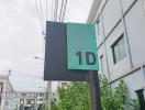 Exterior view of a building with address sign 1D