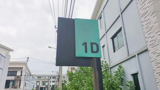 Exterior view of a building with address sign 1D