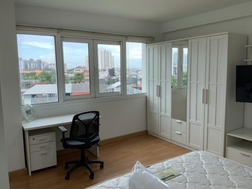 Bright and spacious bedroom with city view