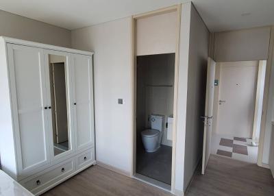 Spacious bedroom with ensuite bathroom and large wardrobe