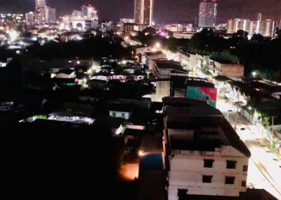 Night View of a City with Illuminated Buildings