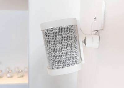 Wall-mounted speaker in a modern room