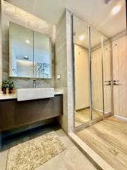 Modern bathroom with glass shower and stylish design