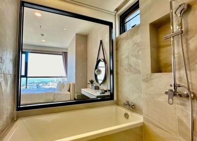 Modern bathroom with large window and shower