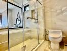 Modern bathroom with glass shower enclosure and large mirror