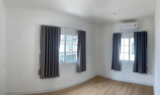 Minimalist bedroom with ample natural light