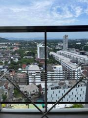 High-rise balcony view overlooking the city